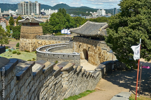 Gate and Wall of Historic Hwaseong Fortress in Suwon City, South Korea photo
