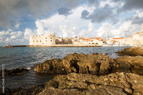 Dubrovnik Old City lighthouse as seen from Banje beach photo