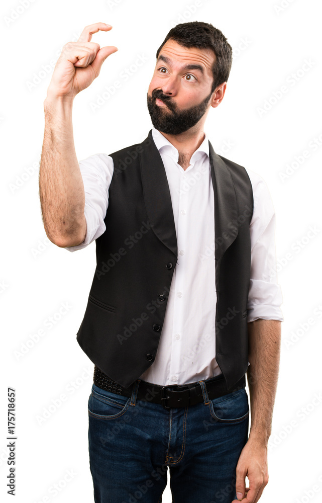 Cool man making tiny sign on isolated white background Cool man making tiny sign on isolated white background