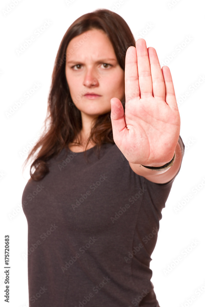 Attraktive junge Frau zeigt Stop Attraktive junge Frau zeigt Stop