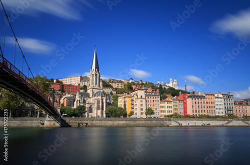 Passerelle (footbridge) Saint Georges over the Saone river and the Saint Georges church in Lyon, France.