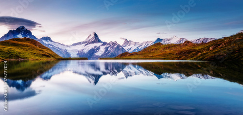 Panoramic view of the Mt. Schreckhorn and Wetterhorn. Location Bachalpsee in Swiss alps  Grindelwald valley  Europe.