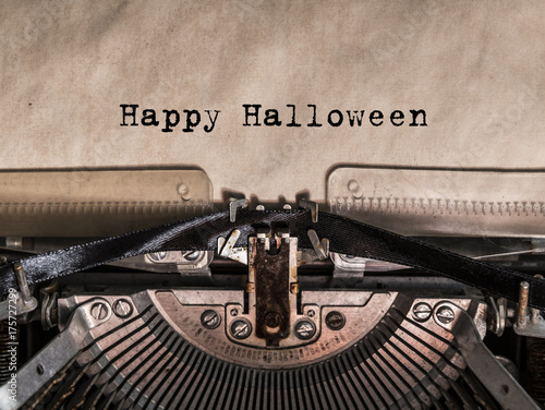 Happy Halloween printed on a vintage typewriter. old typewriter with text happy halloween