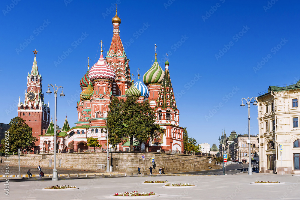 St. Basil's Cathedral and the Spassky Tower of the Moscow Kremlin St. Basil's Cathedral and the Spassky Tower of the Moscow Kremlin