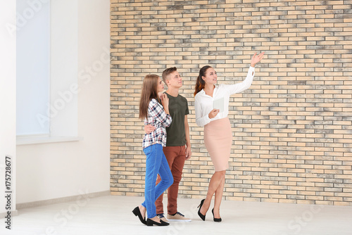Estate agent with tablet an...