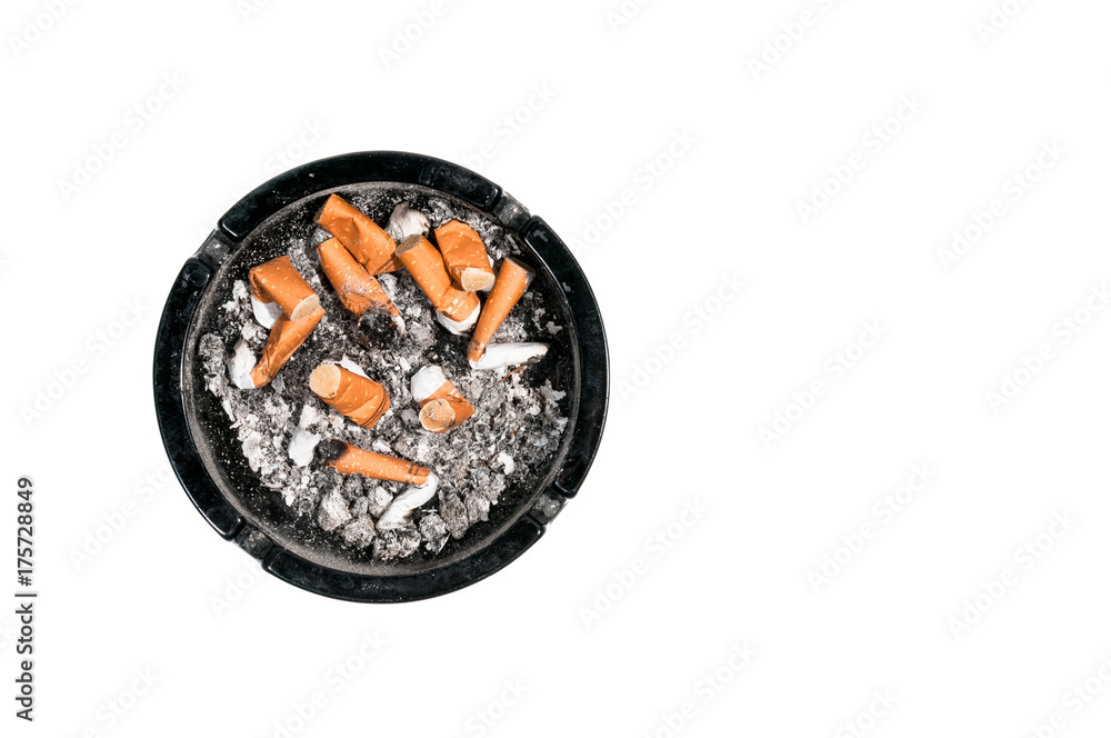 Dirty ashtray, Dirty black ceramic ashtray with a cigarette full of smoked butts view from above Dirty ashtray, Dirty black ceramic ashtray with a cigarette full of smoked butts view from above