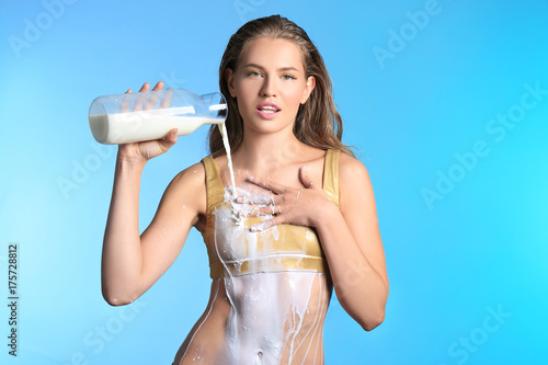 Girl Pouring Milk On Herself Girl Pouring Milk On Herself