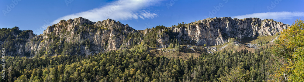 panoramic photo of the mountain range of the Stone sea, mountain Nagoy - Kosh altitude 2090 meters above sea level. The Adygea Republic, the Western Caucasus panoramic photo of the mountain range of the Stone sea, mountain Nagoy - Kosh altitude 2090 meters above sea level. The Adygea Republic, the Western Caucasus