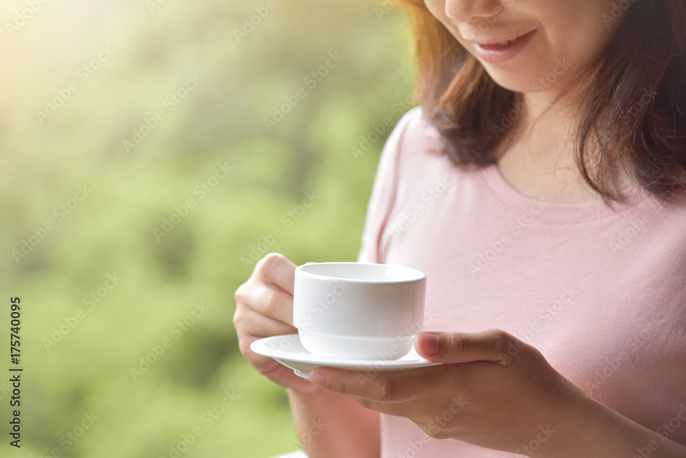 Woman in Glasses holding cup of coffee. Woman in Glasses holding cup of coffee.
