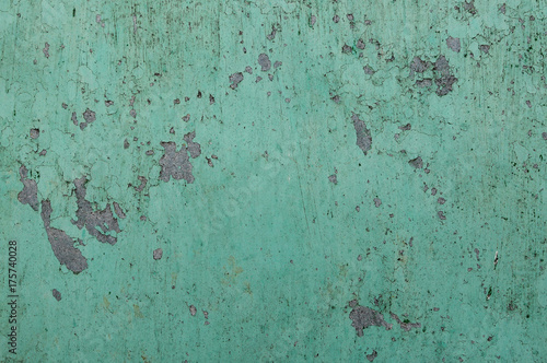 Close up peeling paint on a concrete wall, cracked paint background