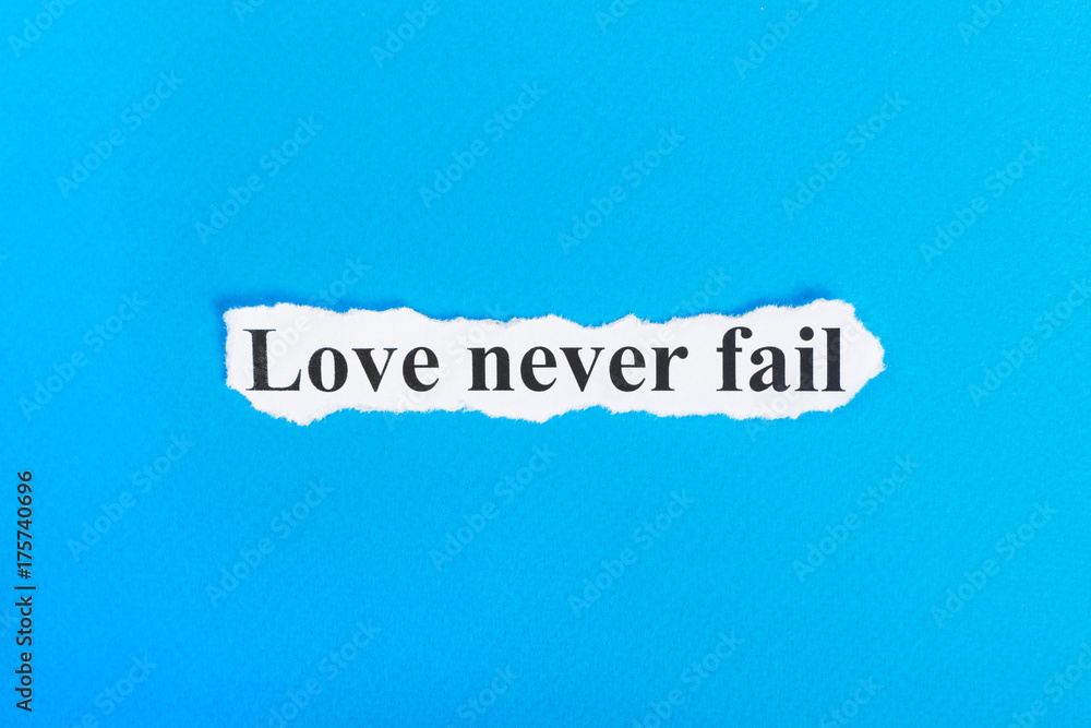 Love never fail text on paper. Word Love never fail on torn paper. Concept Image Love never fail text on paper. Word Love never fail on torn paper. Concept Image