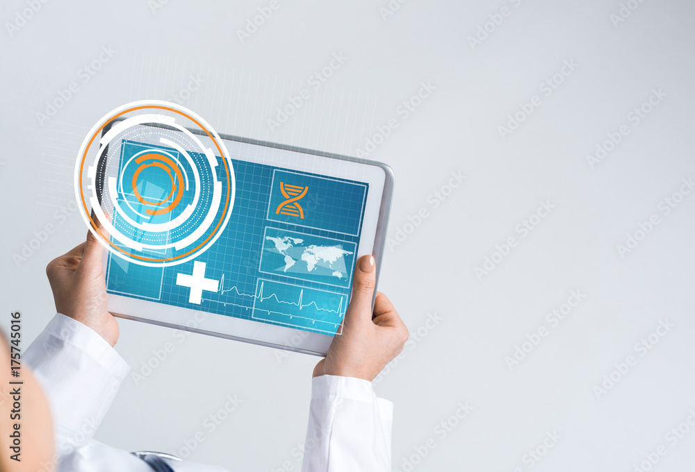 Close of female doctor hands working with tablet pc computer Close of female doctor hands working with tablet pc computer