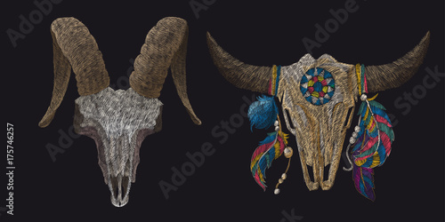 Peonies and skull of a cow with feathers. Traditional folk stylish stylish embroidery on the black background. Sketch for printing on fabric, clothing, bag, accessories and design. Vector, trend