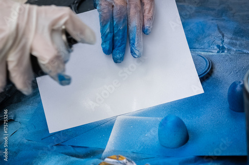 Wallpaper Mural Painting with spray gun. Detail on hands Torontodigital.ca