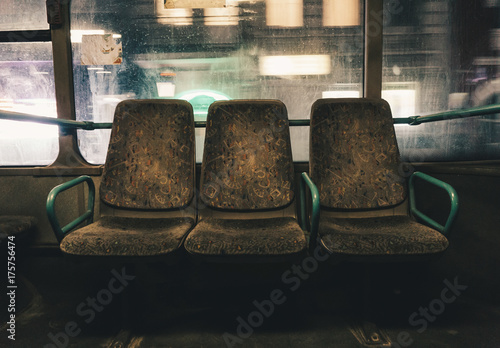 Seats in an empty night bus in the city