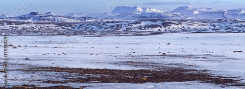 Panoramic winter landscape with snowy peaks. Central highlands, Iceland.