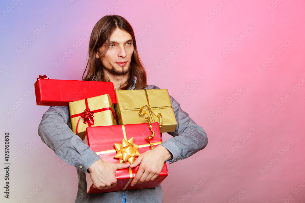 Guy with many presents gift boxes Guy with many presents gift boxes