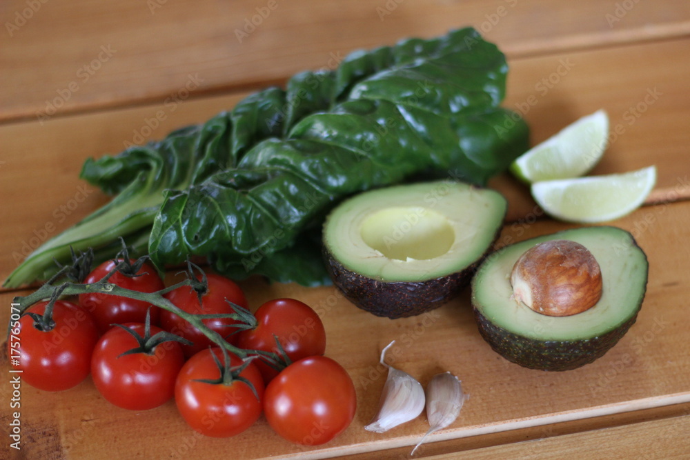 Avocado cut in half with vegetables Avocado cut in half with vegetables