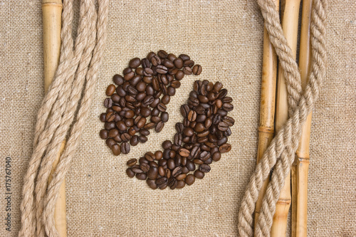 coffee beans on a sack background photo