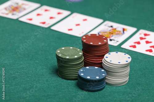 Casino table and poker chips with cards