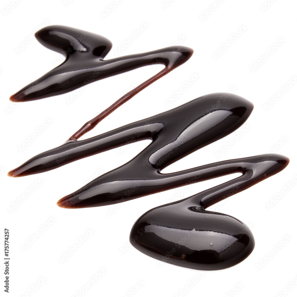 Chocolate syrup drop isolated on white background Chocolate syrup drop isolated on white background