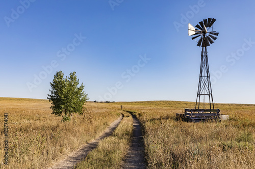 An old windmill along a field road outise of Matheson Colorado.