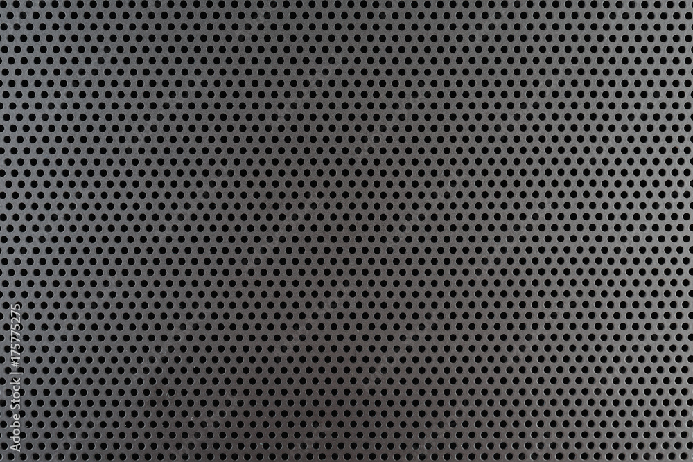Metallic background with round holes Metallic background with round holes