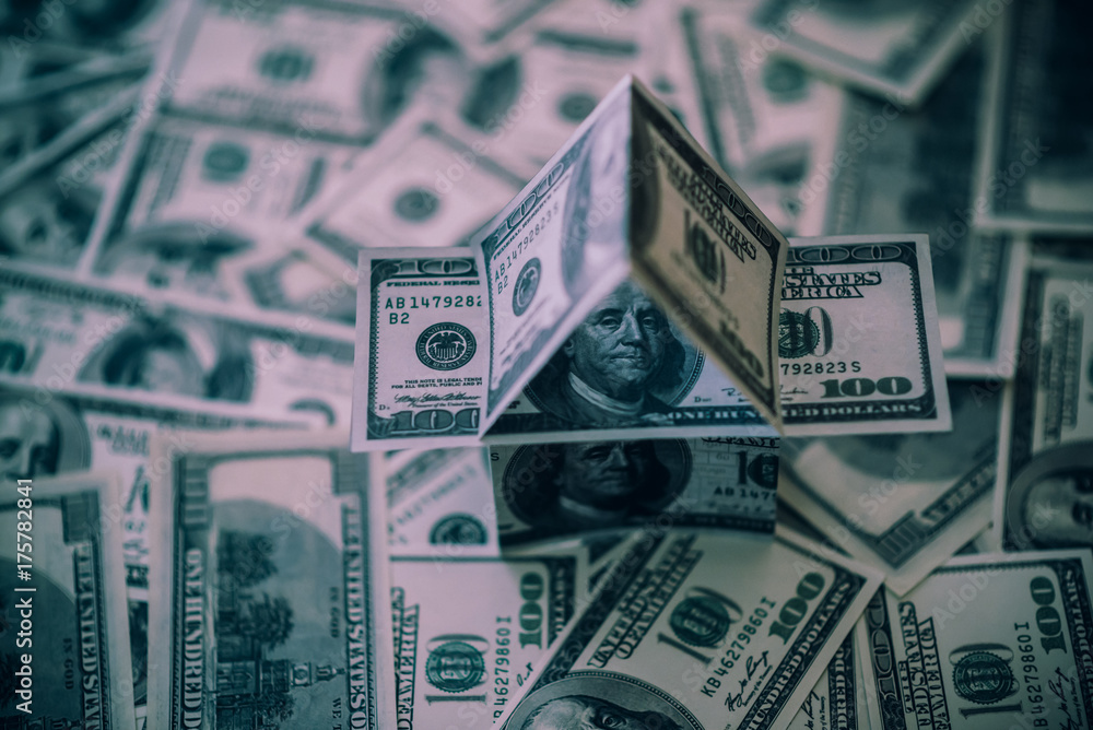 US dollar banknotes on display in the shape of a house on the expansion of the money US dollar banknotes on display in the shape of a house on the expansion of the money