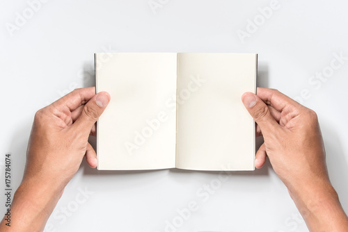 Notebook Mock-up. Hands holding opened blank paper on white background.