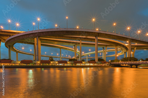 Photography Highway intersection water front at twilight, transport background