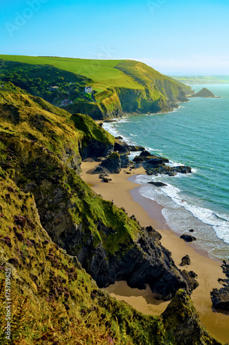 Looking along coastline towards Llangrannog village and beach in Pembrokeshire, Wales, UK