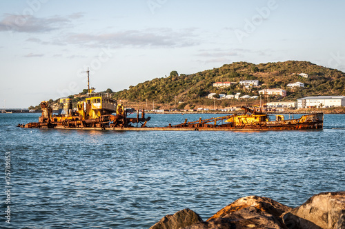 Old sunken ship. Weathered and rusted.