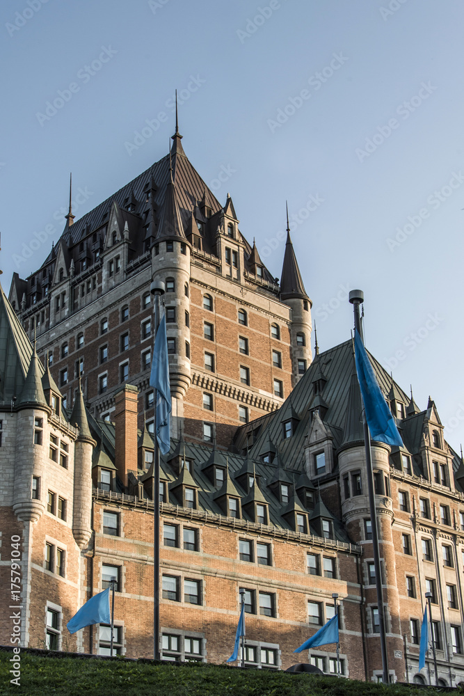 Canada Quebec City Sunset Chateau Frontenac most famous tourist attraction UNESCO World Heritage Site flags circle below