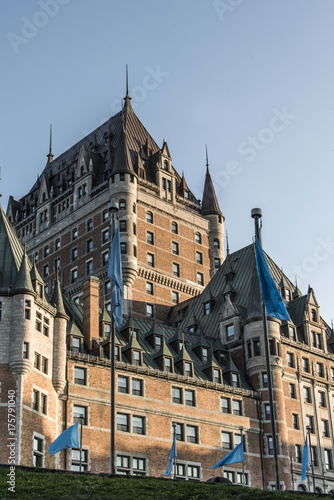Canada Quebec City Sunset Chateau Frontenac most famous tourist attraction UNESCO World Heritage Site flags circle below