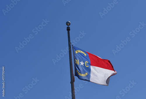 North Carolina state Flag with clear blue sky background