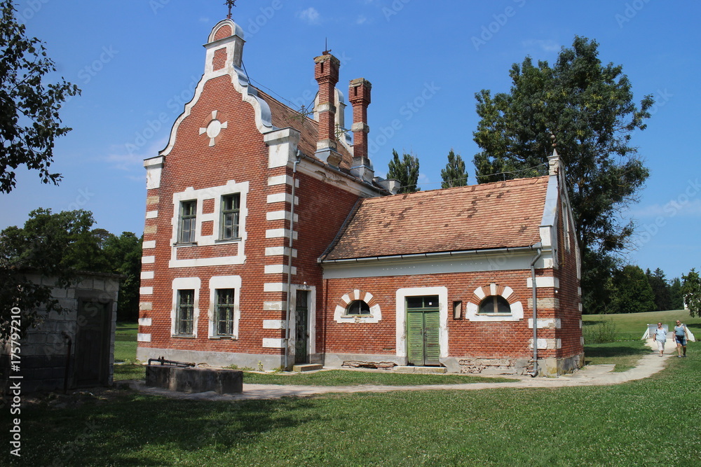 Holland house (A Holland Ház) on isle in garden of Classicist manor house in Dég, Hungary