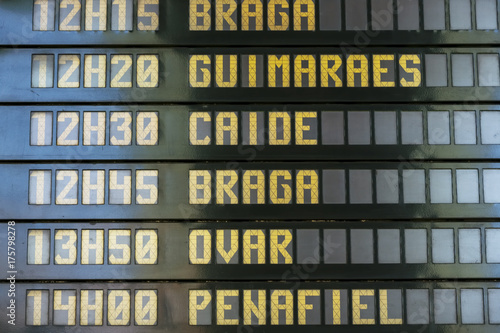 Departure board at the Sao Bento railway station in Porto, Portugal