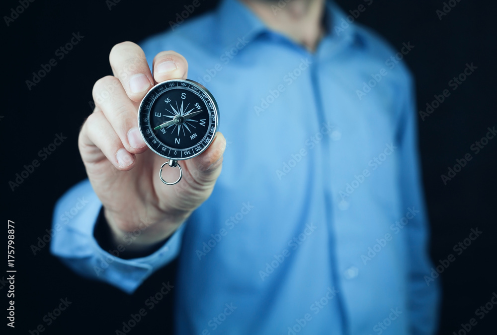 Man holding compass