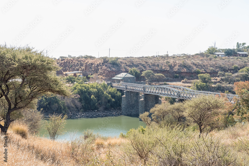 Toll house and old bridge over the Vaal River