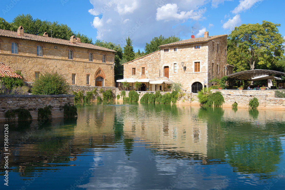 A sunny day by the ancient thermal pool in Bagno Vignoni. Tuscany, Italy
