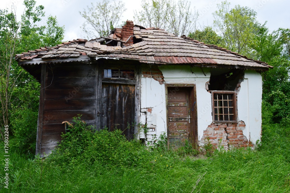an old, abandoned, ruined house