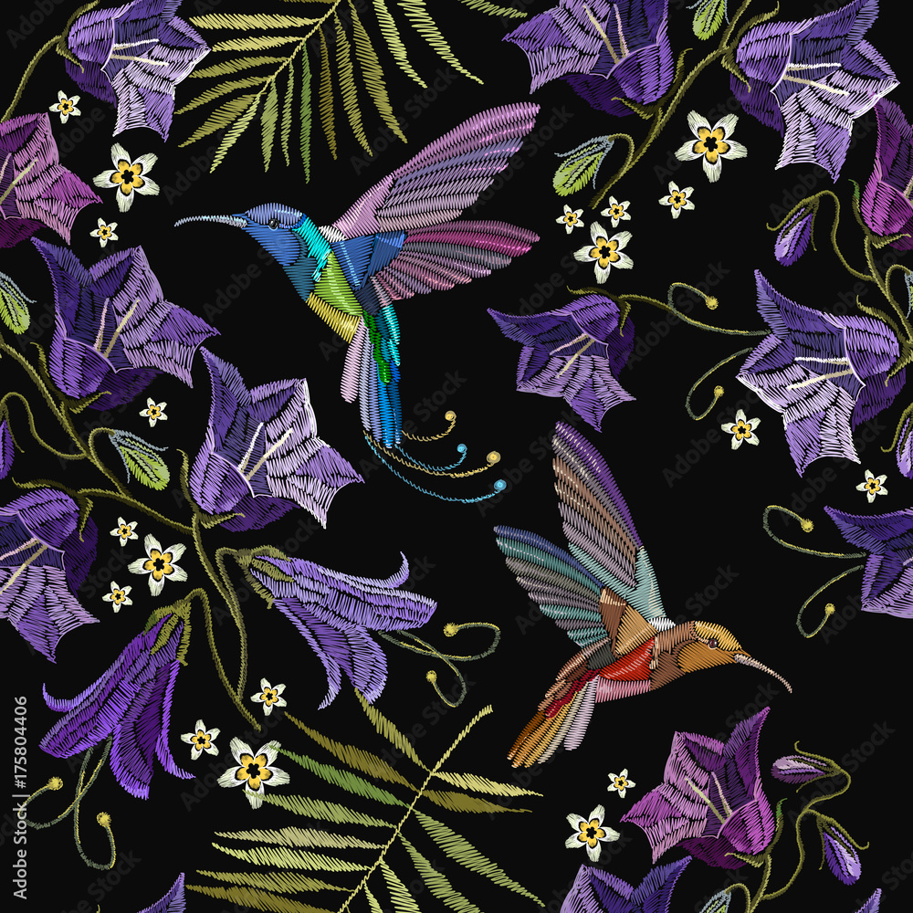 Embroidery violet flowers bells and humming bird seamless pattern. Beautiful violet cornflowers and humming bird, classical embroidery pattern. Fashionable template for design of clothes