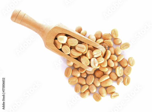 Coffee beans in scoop on white background