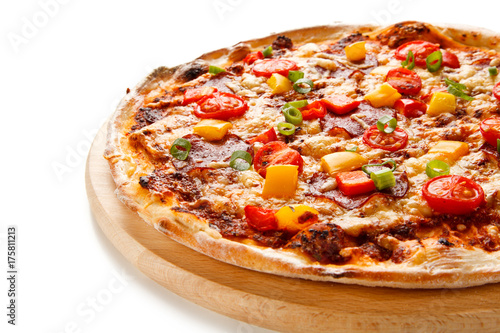 Pizza pepperoni with tomatoes, mushrooms and pepper