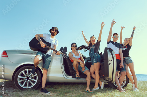 Group Of Friends Standing By Car © fotofabrika