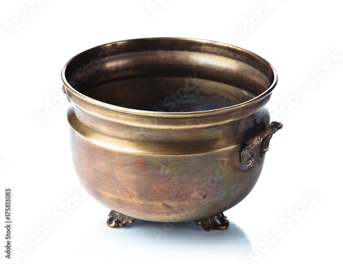 Old brass pot  isolated on a white background. © Igor Normann