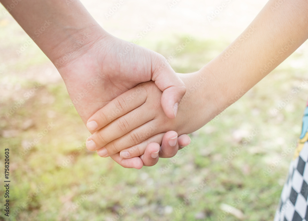 Asian little girls holding hands couple together show Relationship between sister and familay at outdoor, Love parents friendship concept.