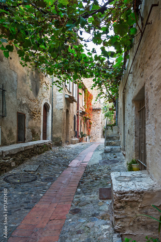 Old narrow street in the in France.