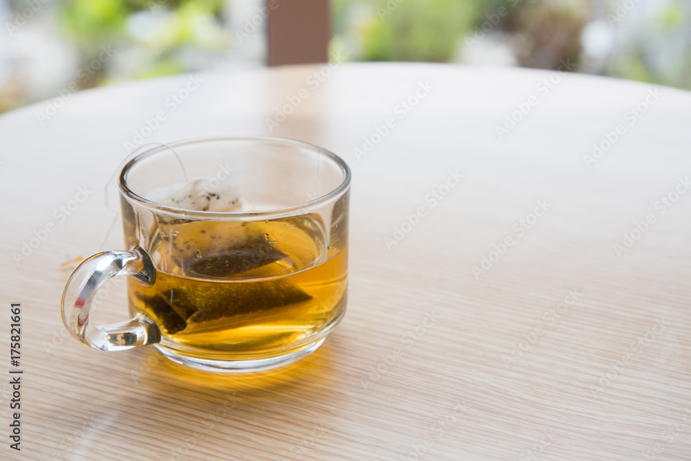 A cup of tea with wooden table background A cup of tea with wooden table background