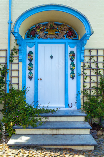 Beautiful porch, decorated with colorful stucco molding